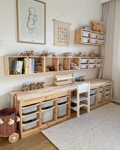 a child's playroom with toys and bookshelves