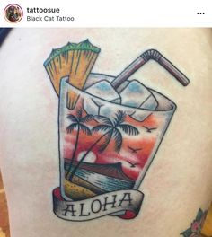 the back of a woman's thigh with a tattoo on it that says aloha