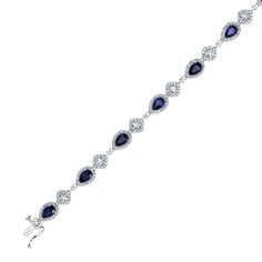 Introducing Downton Abbey by REEDS Jewelers. This bracelet is inspired by Cora Grantham, the wife of Lord Grantham. Fashioned in sterling silver, this bracelet features alternating pear cut, created blue sapphires and princess cut, created white sapphire. Additional created white sapphires dazzle throughout the design, for an elegant display. Bracelet measures 7.25 inches in length and secures with a tong closure. (c) Carnival Film & Television Limited. All Rights Reserved Silver Pear-shaped Anniversary Bracelets, Classic Pear-shaped Bracelets For Formal Occasions, Silver Pear-shaped Bracelets For Anniversary, Pear-shaped Silver Bracelet For Anniversary, Elegant Pear-shaped Silver Bracelet, Classic Sapphire Sterling Silver Bracelets, Classic Sapphire Bracelets In Sterling Silver, Formal Silver Teardrop Bracelets, Elegant Blue Bracelet With Sterling Silver Clasp