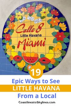 the sign for cafe 8 little havana miami is decorated with colorful flowers and fruit on it