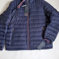 Men's Xl In Navy Brand New With Tags If You Have More Time We Have More Items On Our Page Thanks For Checking Us Out And Have A Beautiful Day Blue Tommy Hilfiger Outerwear With Pockets, Tommy Hilfiger Spring Outdoor Outerwear, Tommy Hilfiger Blue Outerwear For Fall, Casual Blue Tommy Hilfiger Outerwear, Tommy Hilfiger 90s, Puffer Jacket Men, 90s Men, Navy Blue Jacket, Heavy Coat