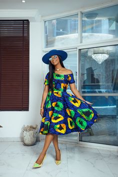 For a stylish yet casual look, this beautiful imani african print off shoulder dress is the perfect choice. Its African print design and waist detail add a touch of elegance. The asymmetrical neckline, along with the contrasting sleeve design, are the highlights of this dress. Complete the look with a pair of lace-up heels. FEATURES.* 100% African Wax Cotton* Short sleeves* Asymmetric neckline* Back zip* Side pockets and Dress is lined* Dress is 42’’ long * Model Is Wearing A Size Small.CARE INS Asymmetric Neckline, Asymmetrical Neckline, Lace Up Heels, Waxed Cotton, Sleeve Designs, African Print, Cotton Shorts, Jacket Tops, Off Shoulder Dress