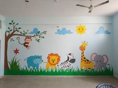 a child's room painted with animals and trees