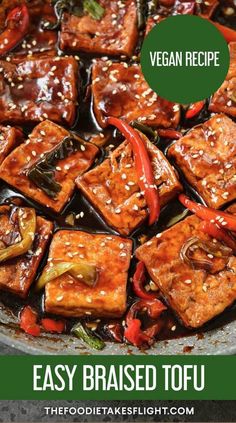 tofu with peppers and sesame seeds in a wok