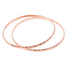 This luminous pair of bangle bracelets is handcrafted in sterling silver and plated with pink gold for a chic modern look. The bracelets are created by Bali's Nyoman Ariawan and feature a neat hexagon motif with a high polish finishing. Modern Rose Gold Bangle, Modern Rose Gold Round Bangle, Rose Gold Stackable Bangle As Gift, Elegant Hammered Rose Gold Bracelets, Adjustable Stackable Rose Gold Bangle, Adjustable Modern Rose Gold Bangle, Rose Gold Hoop Bracelets For Gift, Adjustable Hammered Rose Gold Bangle, Hammered Rose Gold Bangle