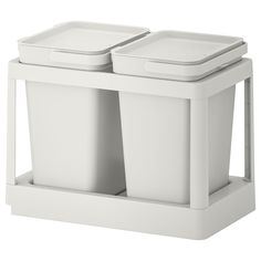 two white bins sitting on top of each other in front of a white background