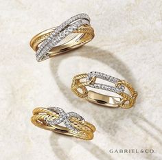 three different types of rings on a marble surface with the words garbile & co written below them