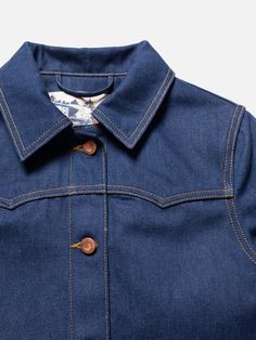 The inspiration for this jeans jacket is evident because it, quite literally, carries it on the sleeves. Pointed, overlaid single-piece cuffs, also known as shotgun cuffs, is a ranch wear classic, as are the pointed back yoke and the single-point front yokes. Being slightly fitted and short, Kelly stays true its lineage, like the hue of the tobacco seams.   The denim’s clear blue tone is a textbook display of red cast denim. And the tightness of the twill makes the blue pop even more. So we went Classic Fitted Single-breasted Denim Jacket, Western Style Denim Blue Jacket For Fall, Fitted Single Breasted Blue Denim Jacket, Fitted Blue Single Breasted Denim Jacket, Fitted Long Sleeve Denim Jacket With Button Cuffs, Fitted Blue Single-breasted Denim Jacket, Classic Fitted Denim Jacket With Button Cuffs, Fitted Denim Outerwear With Button Cuffs, Fitted Denim Jacket With Button Cuffs