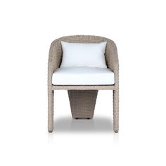 A unique three-leg outdoor dining chair based on the popular indoor silhouette. All-weather wicker framing forms a barrel-shaped back and kick back detail on the leg, accented by a box seat cushion with knife edge back cushion. Covered in 100% olefin, known for its UV-resistant, water-repellent and quick-drying abilities. Cover or store indoors during inclement weather and when not in use. Our Weatherproof Outdoor Dining Chair Cover in size large fits this chair. | Four Hands Fae 32" High Outdoo Natural Dining Chairs, Box Seat, Living Room Decor Pillows, Wicker Dining Chairs, Outdoor Dining Chair, Dining Armchair, Dining Chair Design, White Wicker, Universal Furniture