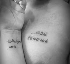 two people with tattoos that say, all that i've ever need are us