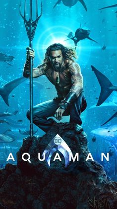 the poster for aquaman is shown in front of sharks