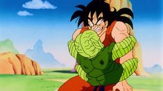 an animated image of gohan holding another character