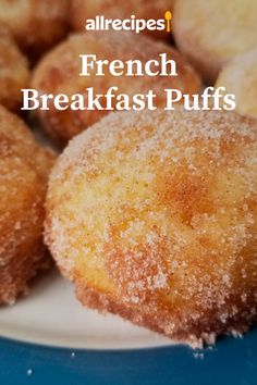 some sugared doughnuts on a plate with the words, allrecipes french breakfast puffs