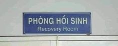 a blue sign that reads phong hoi sinh recovery room