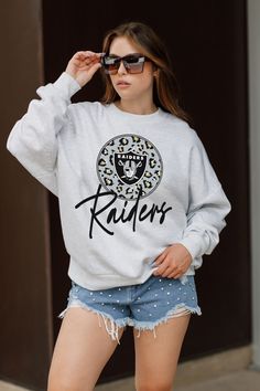 Stand out from the crowd in our Las Vegas Raiders premium fleece long sleeve sweatshirt. Boasting an oversized fit, crewneck and ribbed knit neckline, wrists, and waistband, it effortlessly blends comfort with fashion. Show your support for your favorite school or team in this irresistibly soft sweatshirt. Heather Grey Fleece Sweatshirt, Heather Grey Fleece Sweats With Long Sleeves, Heather Grey Long Sleeve Fleece Sweats, Fan Apparel Long Sleeve Sweatshirt For Fall, Athletic Heather Long Sleeve Sweats For Fall, Long Sleeve Athletic Heather Sweats For Fall, Fall Athletic Heather Fleece Sweats, Athletic Heather Fleece Sweats For Fall, Long Sleeve Fleece Sweatshirt For Sports Season