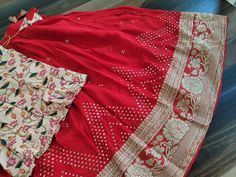 This Lehenga suits 11 yr - 12yr. Kindly Please Message me If needed measurements before purchase. Traditional Silk Palazzo Set With Bandhani Print, Fitted Red Bandhani Print Palazzo Set, Red Fitted Bandhani Print Lehenga, Fitted Red Bandhani Lehenga, Red Fitted Bandhani Lehenga, Fitted Bandhani Print Palazzo Set For Navratri, Navratri Bandhani Print Fitted Palazzo Set, Fitted Traditional Bandhani Print Palazzo Set, Red Cotton Unstitched Blouse Set