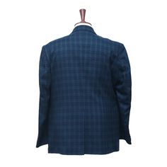 This Chiragh Apparel blazer is an elegant upgrade on dapper tailoring and features rich shades in a sumptuous fabric for elegant opulence. Fashioned from premium quality wool, this geometric check blazer features full lining in Japanese silk, a notch lapel, two-button closure and single-vented back. A left chest pocket and three flap pockets appoint the front while the inside has two (2) pockets on the left and one (1) pocket on the right. A flash of contrast piping is added to the jacket lining Elegant Blue Double Breasted Suit For Semi-formal Occasions, Fitted Wool Sport Coat For Semi-formal Occasions, Bespoke Tailored Tweed Jacket For Formal Events, Bespoke Tailored Tweed Jacket For Formal Occasions, Tailored Three-piece Suit With Long Sleeve For Semi-formal Occasions, Fitted Tweed Jacket With Suit Collar For Formal Occasions, Formal Fitted Tweed Jacket, Tailored Long Sleeve Three-piece Suit For Semi-formal Occasions, Elegant Fall Sport Coat With Custom Fit