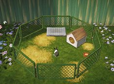 an animal pen with grass and hay in it, including a dog house and two rabbits