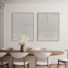 a dining room table with four chairs and two paintings on the wall above it that have white flowers in vases