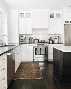 the kitchen is clean and ready for us to use in its new owner's home