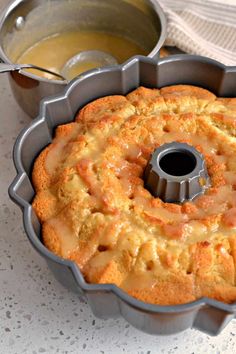 a bundt cake in a pan with icing on top