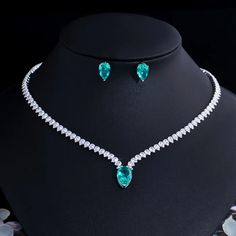 Complete your wedding look with this elegant Bridal Necklace and Earring Jewelry Set. The set is designed to add a touch of sophistication and style to your bridal ensemble, making you shine on your special day.
– This bridal a plus cubic zirconia gemstone necklace set is perfect for adding elegance to any bridal ensemble.– Made with high-quality materials, this set includes a stunning necklace and matching earrings for a complete look.– Perfect for pageant, bridal, bridesmaid, prom, quinceañera Prom Jewelry Sets, Engagement Necklaces, Costume Jewelry Sets, Jewelry Set Design, Crystal Jewelry Sets, Prom Jewelry, Green Water, Fashion Jewelry Sets, Crystal Stud Earrings