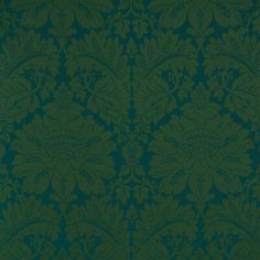 a green wallpaper with an intricate design