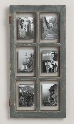 an old window frame with six pictures hanging on the wall in front of white walls