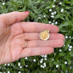 14KT yellow gold matte-finish Saint Benedict round medal pendant charm. St. Benedict is the patron saint of students, Europe, + agriculture workers. Length: 23mm including bail Width: 18mm Weight: 1.42 grams Bail measures: 5mm x 4mm Unisex Design Stamped 14K Hollow Reversible matte side No chain included St Benedict, Saint Benedict, Gold Satin, Design Stamps, Patron Saints, Fantastic Gifts, Matte Gold, Unisex Design, Yellow Gold