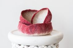 a pair of slippers sitting on top of a white table