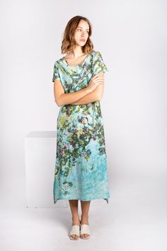 This dress is made of 100% stonewashed linen and comes with a sweet asymmetric design The Claude Monet Rose Bush pattern on both sides of the dress is really eye-catching, and there's even some side pockets to keep your stuff in!  There are a bunch of different sizes available, from XS to 2X, and each size has its own unique measurements for chest, hips, front length, and backside length. The dress is handmade, so there might be some slight variations in measurements, but nothing too crazy. Just a heads up, the colors and prints of the dress might look a little different from what you see on your computer screen. When it comes to taking care of the dress, you should wash it with water temperature 40oC and straighten it out before hanging it up to dry. The linen will actually get softer eac Lagenlook Dress For Summer Daywear, Lagenlook Summer Dress For Daywear, Summer Lagenlook Dress For Daywear, Summer Lagenlook Linen Dress, Flowy Linen Dress For Spring, Flowy Linen Spring Dress, Spring Flowy Linen Midi Dress, Spring Vacation Lagenlook Linen Dress, Spring Beach Linen Dress With Asymmetrical Hem