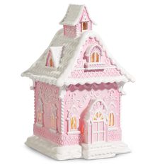 a pink and white doll house on a white background