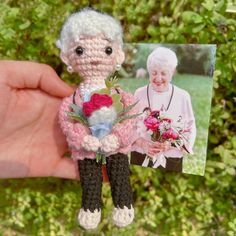 an old woman holding a bouquet of flowers in her hand and a photo of herself