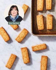 an image of some food that is on a table with a woman's face