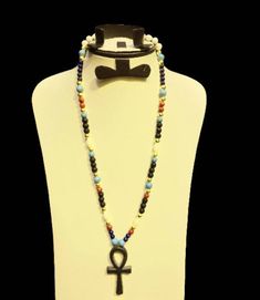 Your Fantastic Egyptian Necklace with the Egyptian Ankh ( key of life ), Your Necklace is made from Brass  with the Natural gemstones ( Lapis lazuli, Agate stone, Turquoise stone ), Specially made for you ;) A very unique piece you will never find it anywhere ;) Symbolic Multicolor Beaded Jewelry, Symbolic Multicolor Round Beads Jewelry, Handmade Symbolic Multicolor Jewelry, Symbolic Gemstone Bead Necklaces For Gifts, Handmade Ankh Spiritual Jewelry, Spiritual Ankh Jewelry For Jewelry Making, Symbolic Natural Stone Pendant Necklace, Handmade Ankh Symbolic Necklace, Blue Ankh Jewelry Gift