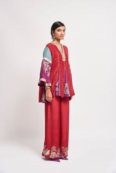 Auburn red applique embellished habutai silk short godet kurta, wide leg pants & teal dupatta. From Aisha Rao's Kinfolk collection. DELIVERY TIMEPlease allow 6-8 weeks for your outfit to arrive. FABRIC DETAILSSilk Professional cleaning only. Festive Anarkali Pant Set In Chanderi, Festive Chanderi Anarkali Pant Set, Festive Anarkali Chanderi Pant Set, Festive Silk Pant Set With Chikankari Embroidery, Red Silk Palazzo Set With Resham Embroidery, Festive Anarkali Pant Set, Festive Anarkali Pant Set With Straight Kurta, Festive Cotton Silk Palazzo Set For Navratri, Red Palazzo Set With Resham Embroidery For Eid