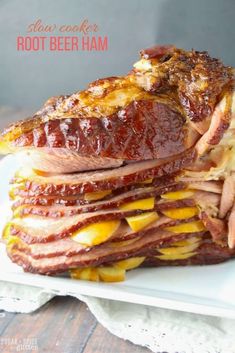 a large roast beef ham sandwich on a white plate