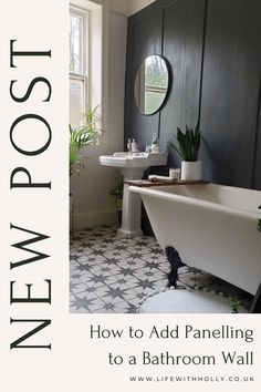 the bathroom is decorated in black and white with a bathtub, sink, toilet and mirror