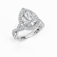 an engagement ring with a pear shaped diamond in the center and two rows of diamonds around it