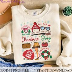 a white shirt with the words christmas story on it next to some shoes and other items