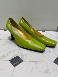 See pics for details and measurements. There is one small scuff I saw when taking pictures and the picture of it is in there. It could probably be cleaned out. I did not try as I am not familiar with how to clean shoes. Vintage Synthetic Heels With Almond Toe, Green Slip-on Heels For Formal Occasions, Green Square Toe Heels, Green Square Toe Heels Medium Width, Vintage Synthetic Almond Toe Heels, Lime Green Sneakers, Spring Lime Green Heels, Lime Green Nike Shoes, Lime Heels