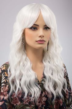 * Color: Pearl White Silver   * Texture: Wavy * Wig Type: Machine Wefted * Length: 20" * Cap Size: 21" to 22.5" * Parting: Free Part * Material: Heat Resistant Fiber * Lace Type: Machine Weft Top * Combs: 3 Combs Experience the fun and excitement of transformation with this 20"" Pearl White Silver Wavy Wig. Featuring a machine wefted open cap construction, this wig provides superior comfort and durability. The beautiful pearl white silver color lends a touch of fantasy to your everyday style, and the heat-resistant fibers allow for versatile styling. With a free part and 3 integrated combs, this wig ensures a secure and natural-looking fit for head sizes from 21" to 22.5". Whether you're changing up your look for a special event or simply wanting to try something new, this wavy wig is an e White Wig With Bangs, Silver Blonde Ombre, Wig Closet, Wavy Wig With Bangs, Blonde Ombre Balayage, Celebrity Wigs, Wig Party, European Hair, Silver Blonde