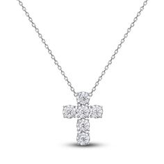 A bold statement of faith, brilliant round diamonds brighten the center of this exquisite women's cross necklace. Fashioned in lustrous 14K white gold, the total diamond weight is 1 carat and the 18-inch cable chain secures in place with a lobster clasp. Chanel Set, Diamond Cross Necklace, Jared The Galleria Of Jewelry, Necklace Clasps, Diamond Cross Pendants, Diamond Cross, Cross Jewelry, Cross Pendant Necklace, 1 Carat