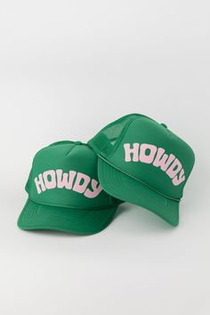 Classic Howdy trucker hat. Screen printed "Howdy" art on the front foam panel. High crown fit with adjustable snapback closure. Features- Puff "Howdy" Screenprint- Adjustable Fit- High Crown Mesh Trucker Content + Care- 100% Polyester Front; 100% Polyester Mesh Back- Spot clean- Domestic Green Snapback Hat With Letter Print, Green Snapback Cap With Letter Print, Green Letter Print Snapback Cap, Green Snapback Baseball Cap With Letter Print, Green Letter Print Snapback Baseball Cap, Green Trucker Baseball Cap With Letter Print, Green Trucker Hat With Letter Print And Curved Bill, Green Trucker Hat With Letter Print, Green Trucker Cap With Letter Print