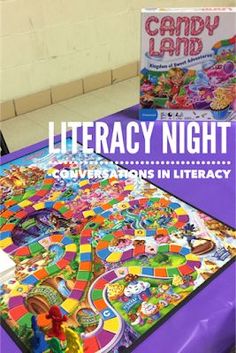 a purple table topped with a board game next to a copy of the book library night conversations in literature