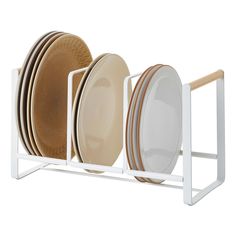 a rack with plates and cups in it on a white background for storage or display