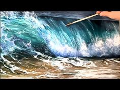 a painting of a hand holding a paintbrush over a wave