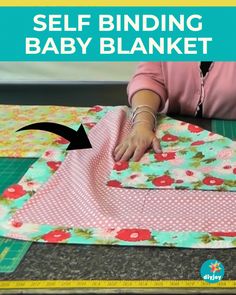 a woman is making a baby blanket with the words self binding baby blanket on it