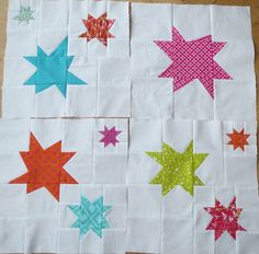 four star quilts laid out on top of each other