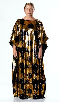 You don't have to wait until spring to bloom, you can get the Any Old Iron Golden Quantastic Quaftan and bloom all year round! This golden kaftan of happiness has a v-neckline and is decked out in a golden floral pattern from the neckline to the hem. The stunning gold sequins flip to black and the black sequins flip to the vibrant gold. It is perfect for any vacation, event, and performance! The light weight material is super breathable and soft on the skin. This Quantastic Qaftan is literally t